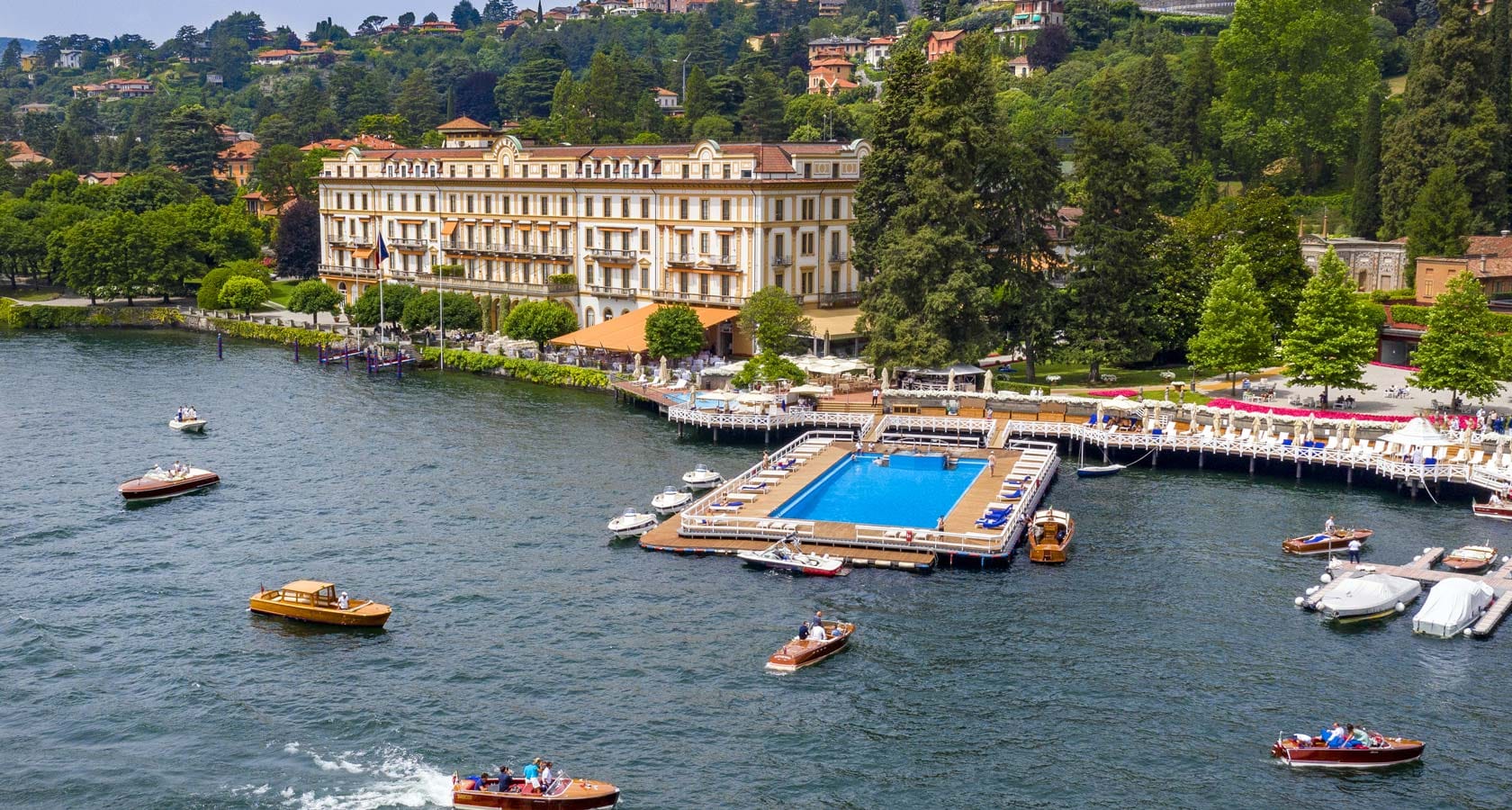 Villa d'Este in Cernobbio — the most famous five-star hotel on Lake Como. Luxury boats pick up guests directly from the property.